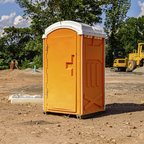 what is the cost difference between standard and deluxe portable restroom rentals in Hubert NC